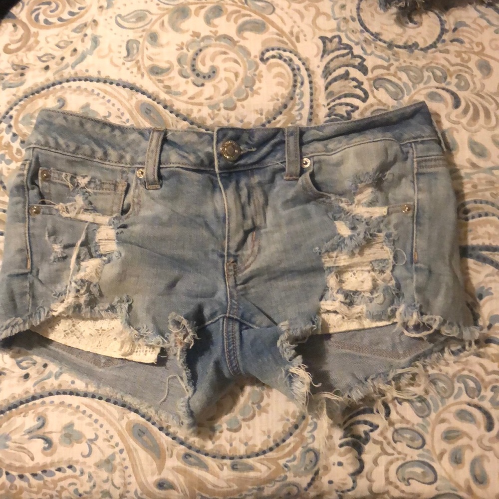 Light wash jean shorts.